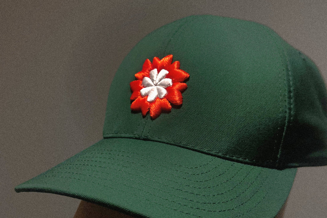 English Tudor rose embroidery on British racing green cap